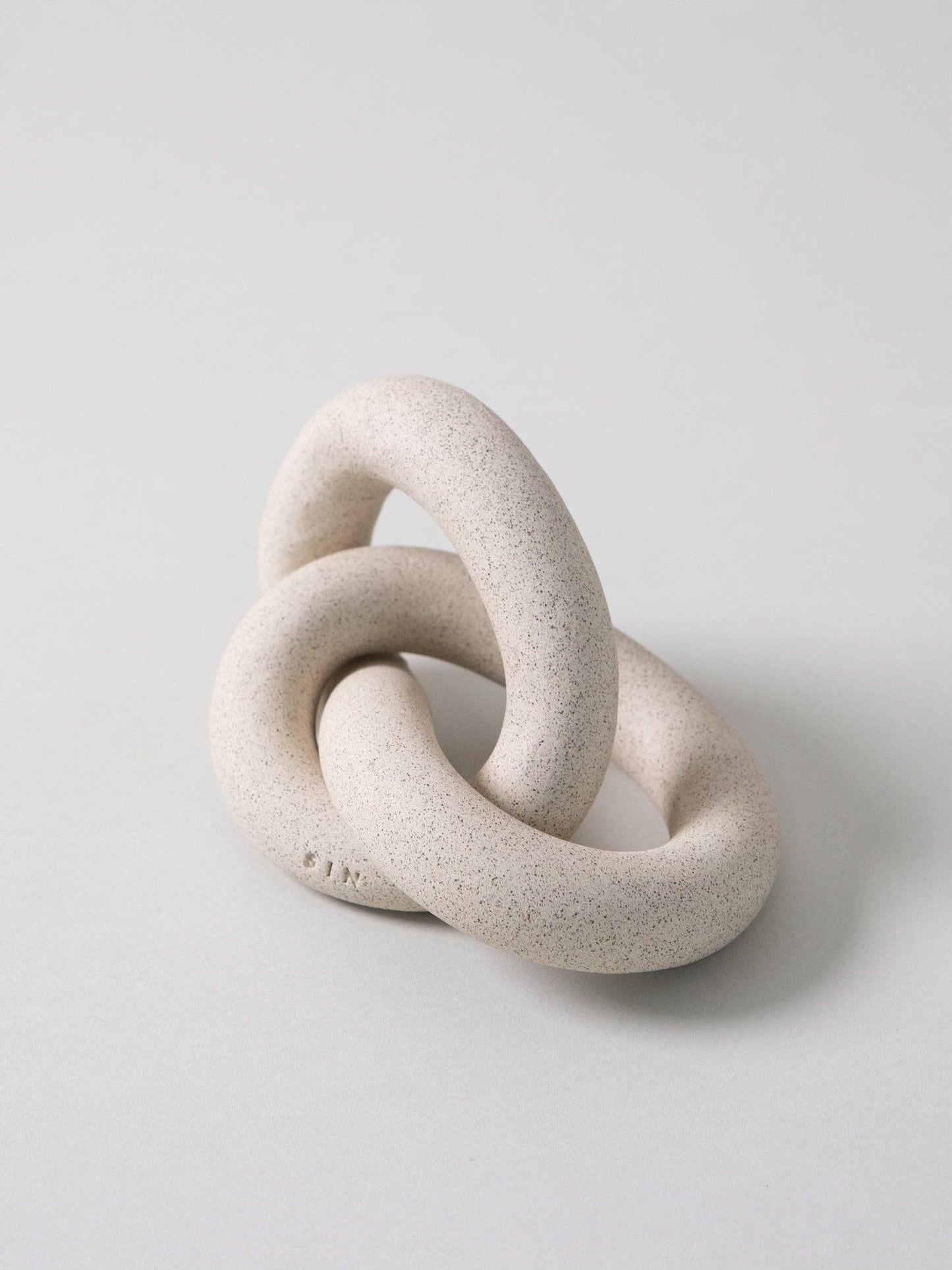 Infinity Knot, Sand -  by Carlyle Avenue