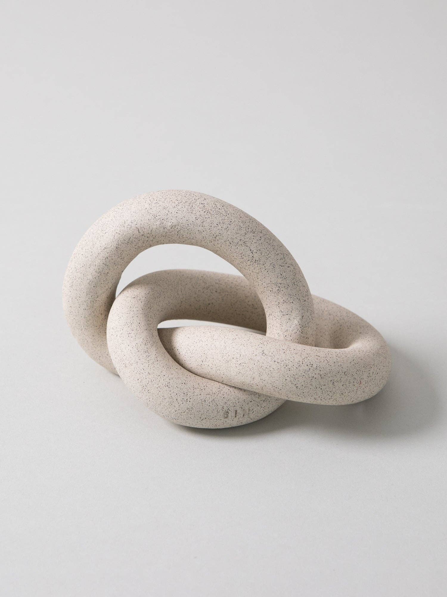 Infinity Knot, Sand -  by Carlyle Avenue