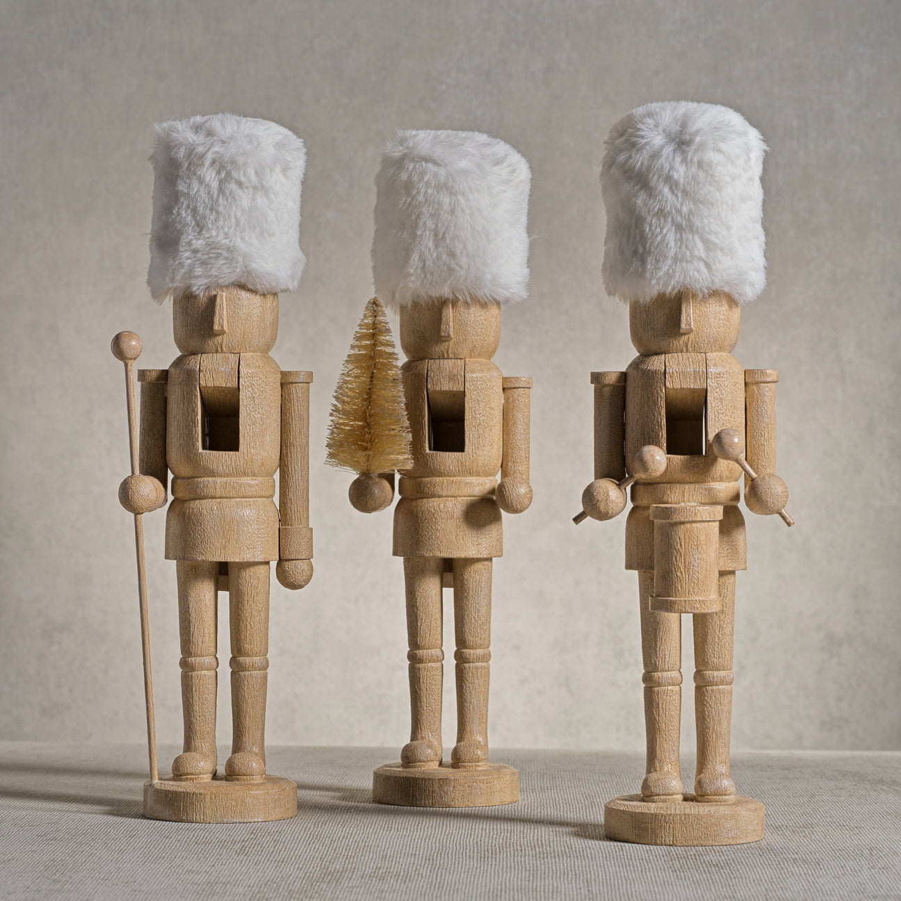 Resin Nutcrackers with White Fur Hats - Set of Three - Christmas Decor by Carlyle Avenue