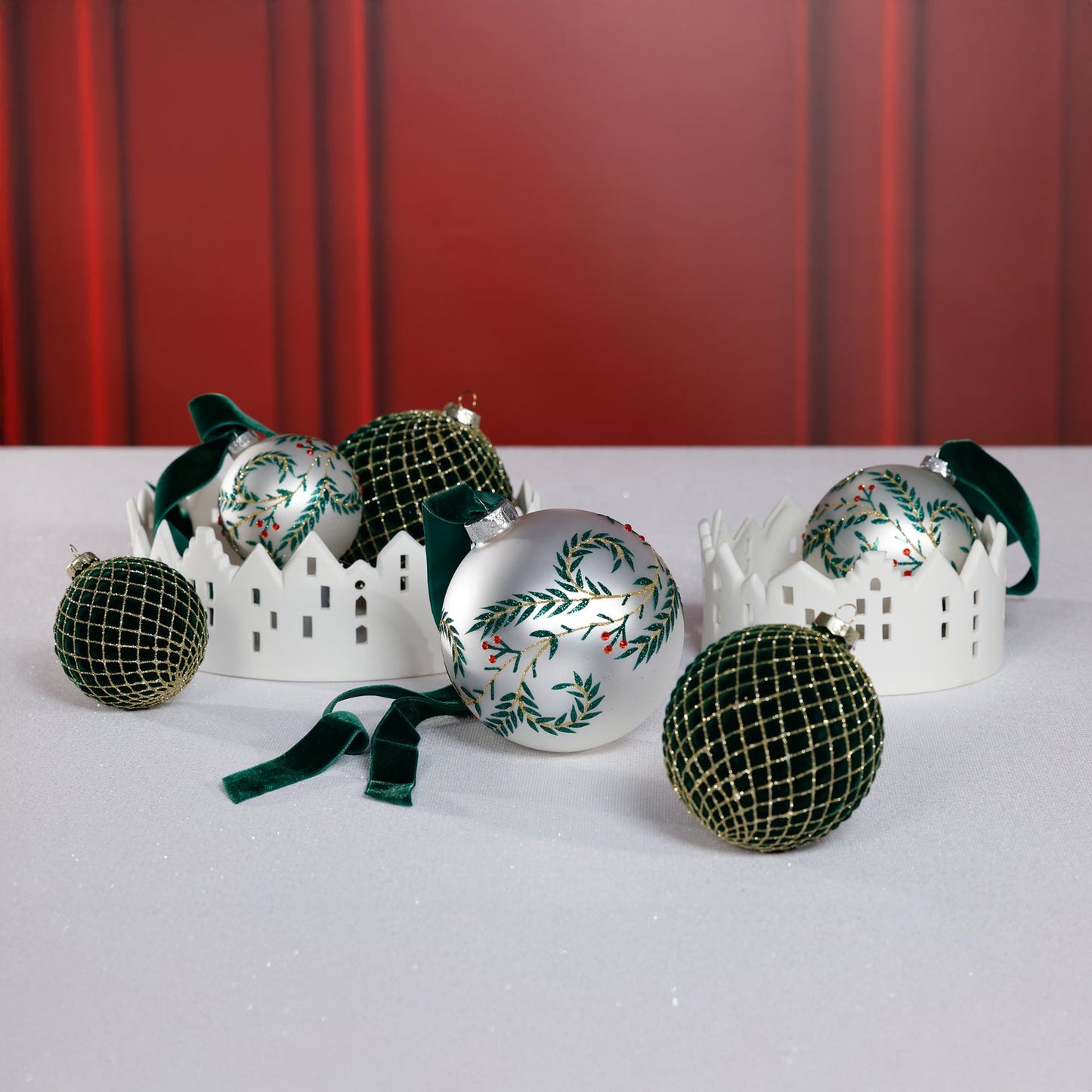 Metallic White Glass Ball Ornament with Green Leaf Design