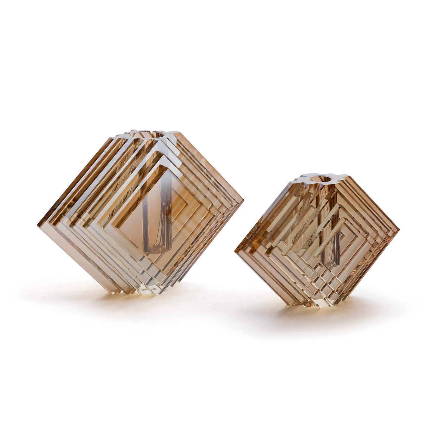 Two geometrically shaped objects with a honeycomb pattern on a white background