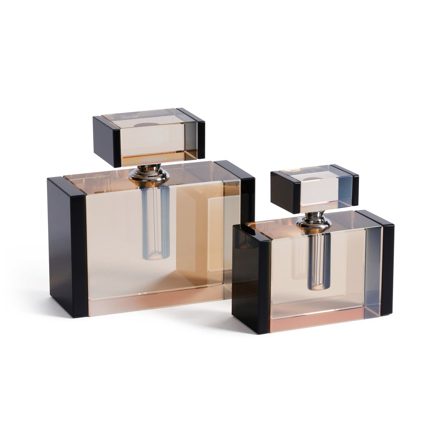 Two modern glass perfume bottles on a white background