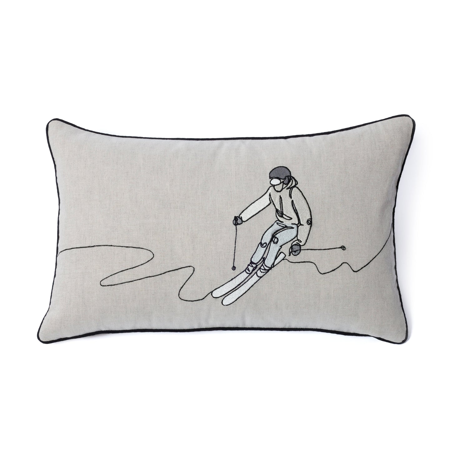 Decorative pillow with a skier design on a plain background