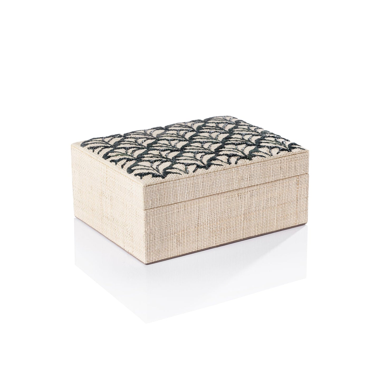 Rectangular raffia box with black embroidered petal pattern on the lid