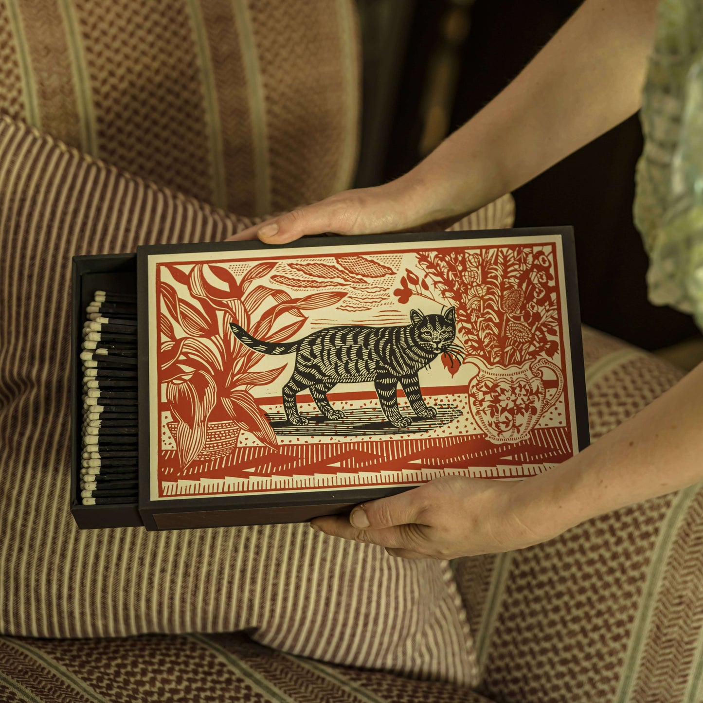Sasha | Giant - Safety Matches box featuring Sasha the Cat and red ink plants, a bold statement piece.