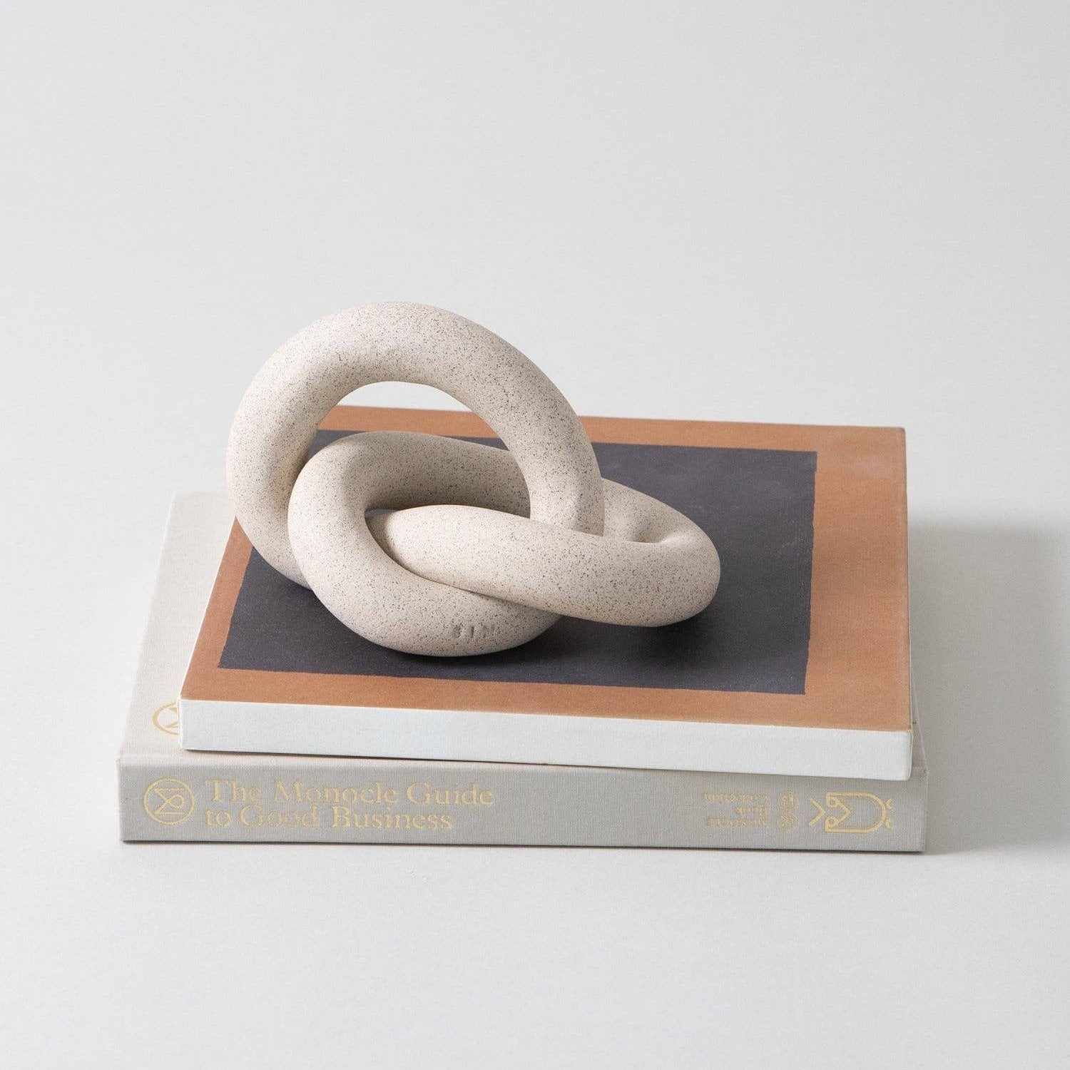 Infinity Knot, Sand -  by Carlyle Avenue