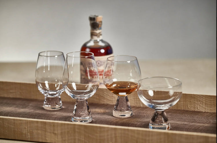 whiskey glasses with bottle