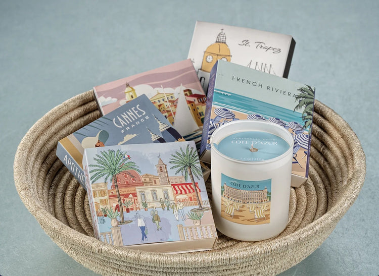 basket with a candle and french riviera matches