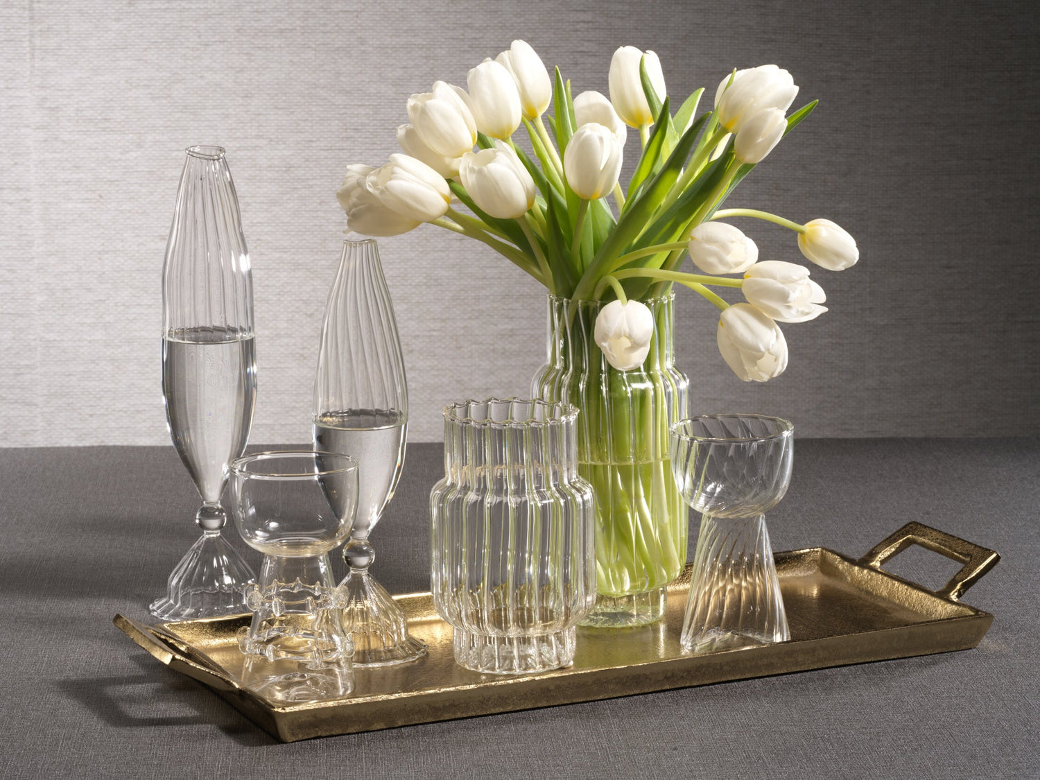 White vases of various sizes