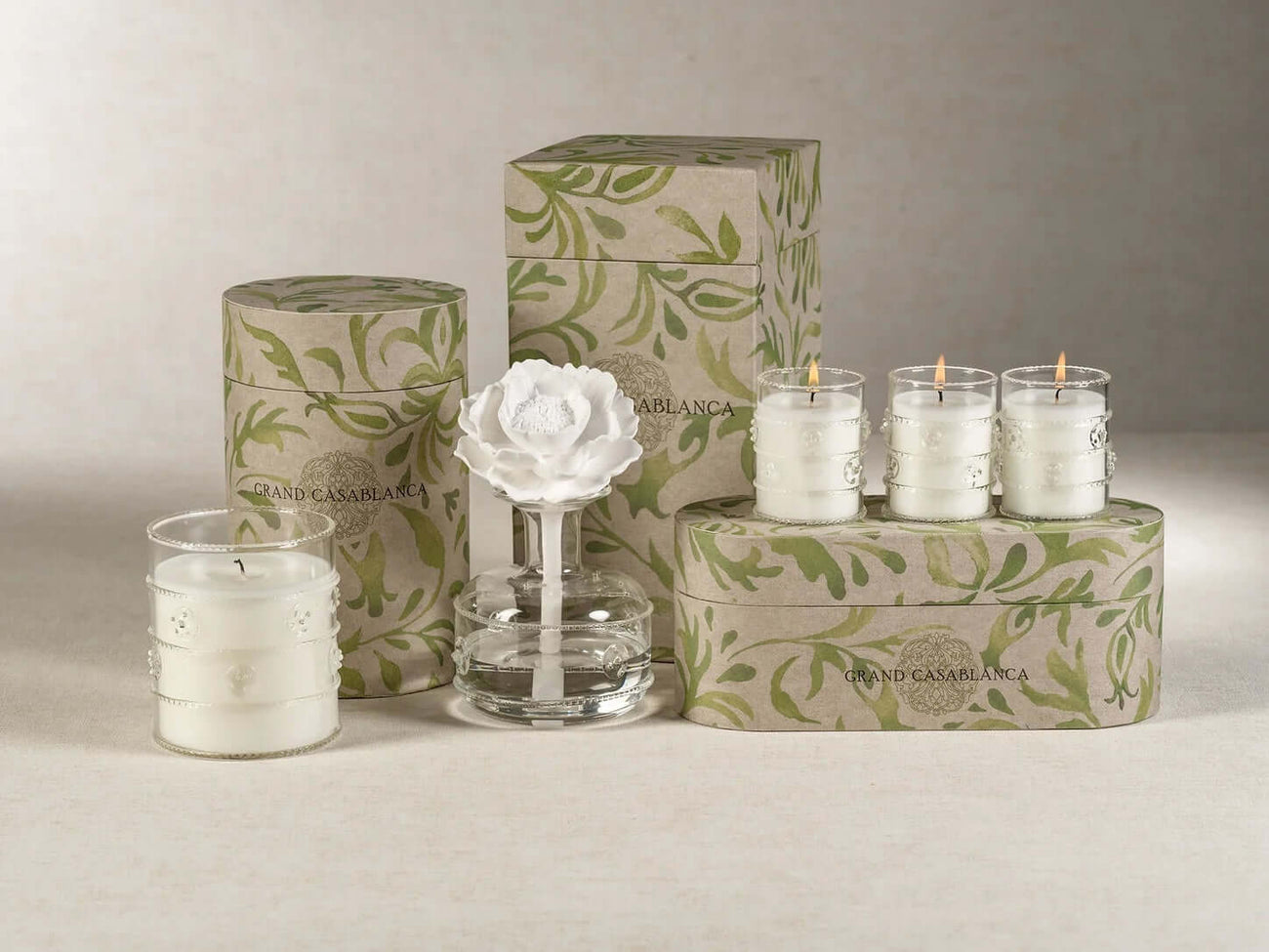 Home Fragrance Collection featuring elegant candles and diffusers, perfect for creating a warm, inviting ambiance.