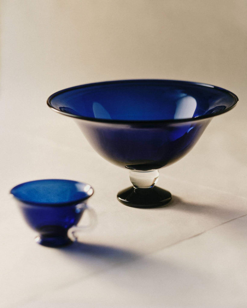 Elegant glass Fruit Bowl, Blue/Clear with a petit base and a bulbous center, ideal for stylish serving.