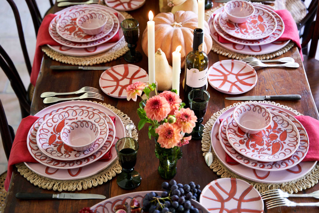 Amalfi Dessert Plate Pink - 9.1" Diameter elegantly set on a rustic dining table with seasonal decorations.