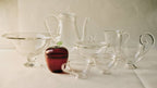 Sauciere, Clear collection of elegant glassware including bowls and cups, perfect for serving sauces and beverages.
