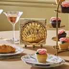 Cap Ferrat fan shell napkin holder, gold, lifestyle shot