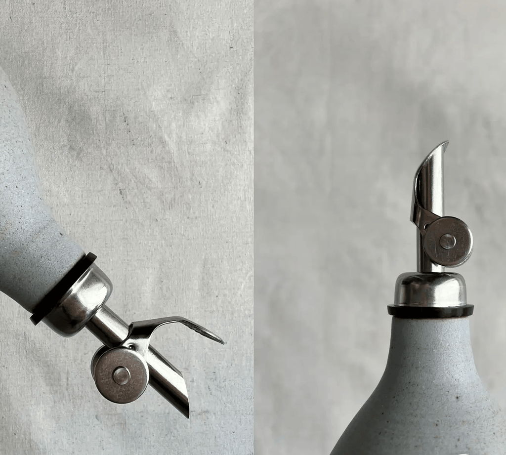 Handmade Ceramic Oil Bottle with polished chrome pourer and matte glaze finish.