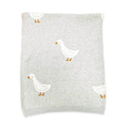 Duck Waddle - Organic Jacquard Knit Baby Blankets featuring a charming duck motif on soft fabric.