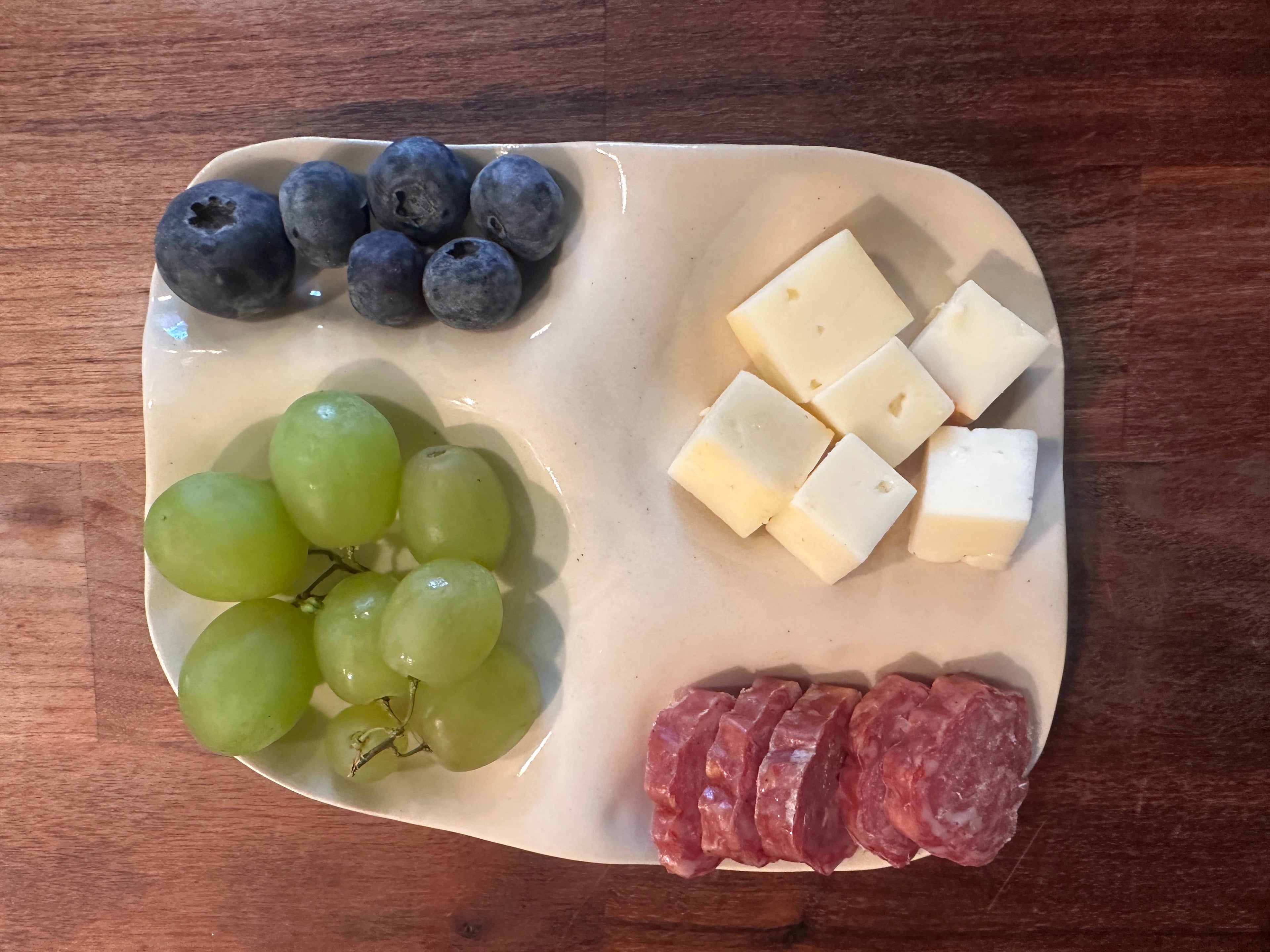White ceramic snack plate