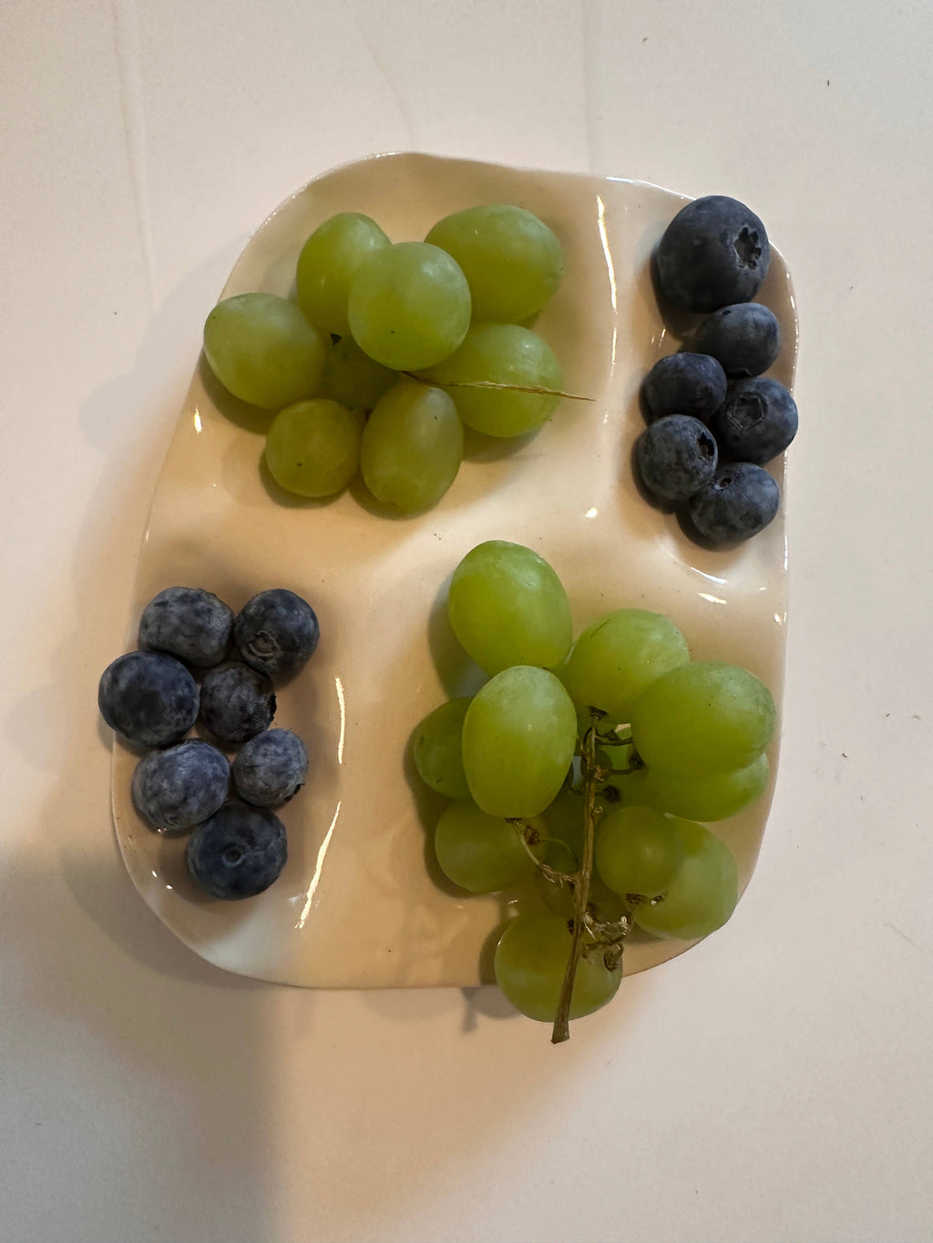 White ceramic snack plate