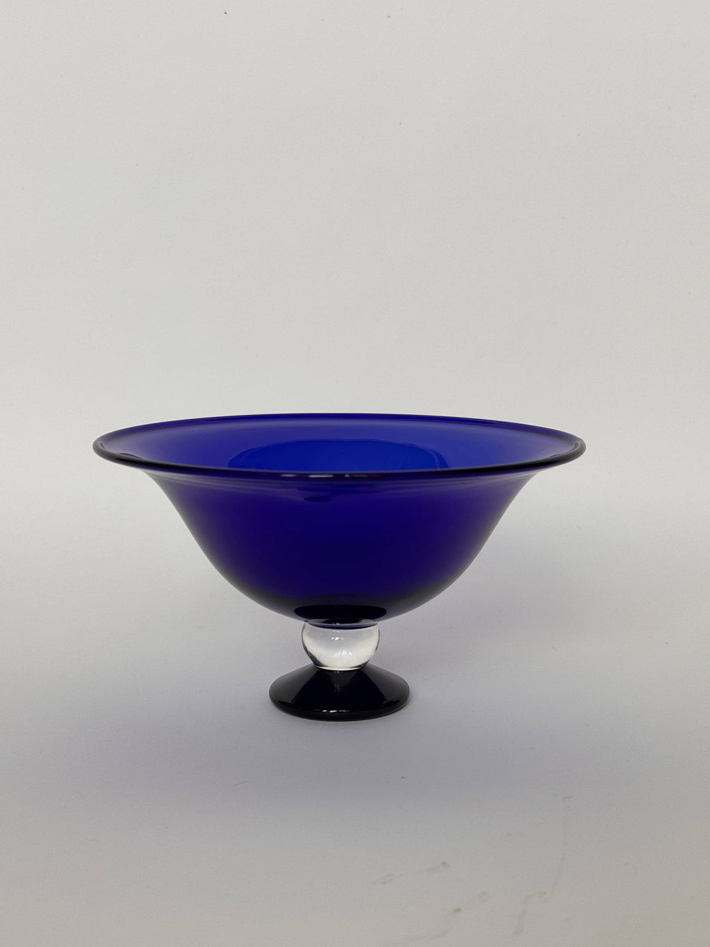 Fruit Bowl, Blue/Clear with a bulbous center and a petit base, perfect for stylish serving.
