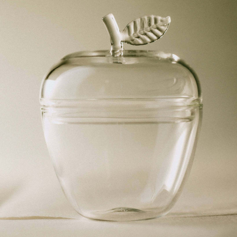 La Pomme, Clear glass apple decorative object, inspired by childhood memories of sugar cube jars.