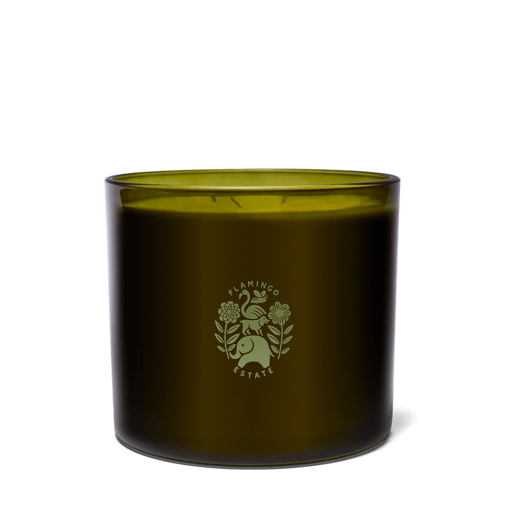 Heirloom Tomato Candle - 3-Wick in a hand-blown glass vessel with a floral logo.