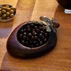 acorn nut bowl with chocolate covered nuts inside