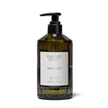 Flamingo Estate Rosemary Clary Sage Glass Hand Soap in translucent green glass bottle with pump.