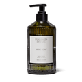 Heirloom Tomato Glass Hand Soap in a custom glass vessel by Flamingo Estate, elevating bathroom aesthetics.