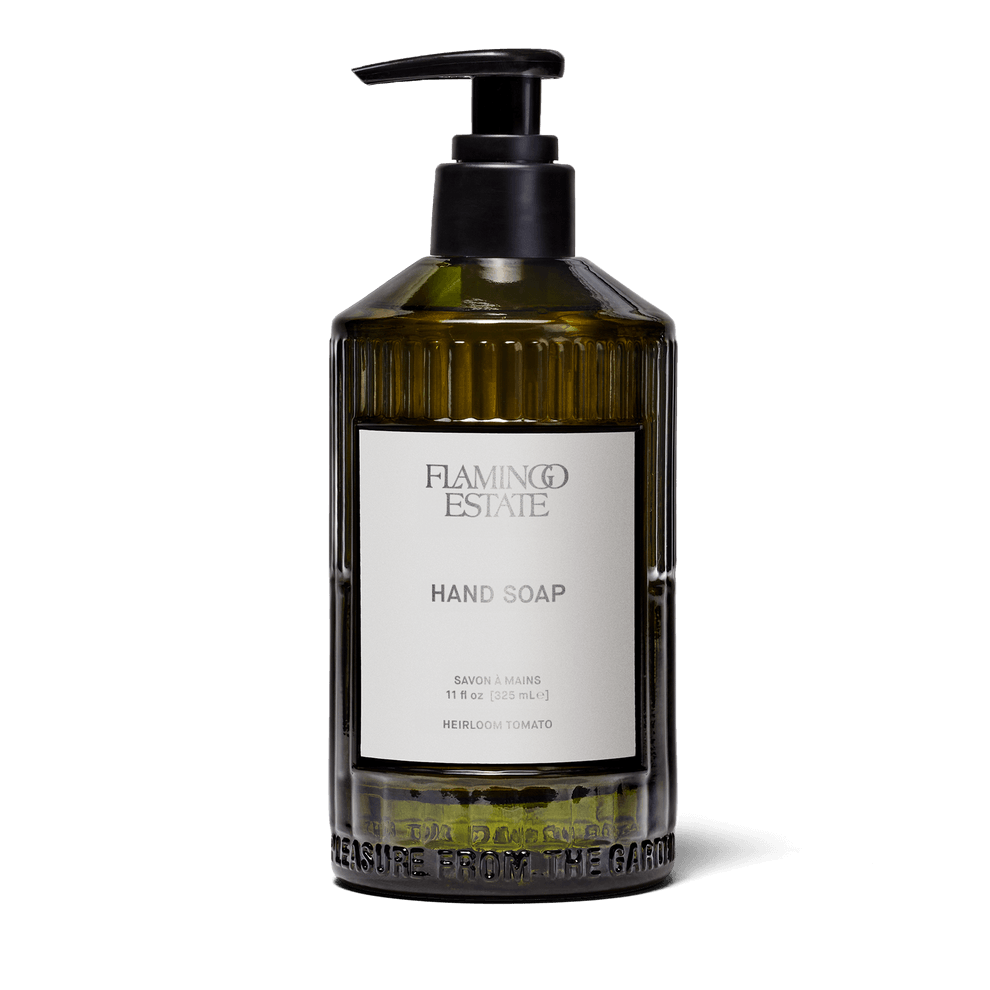 Heirloom Tomato Glass Hand Soap in a custom glass vessel by Flamingo Estate, elevating bathroom aesthetics.