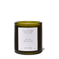 Golden Pollinator Candle in an elegant green jar, exuding a warm, honeyed scent reminiscent of summer blooms.