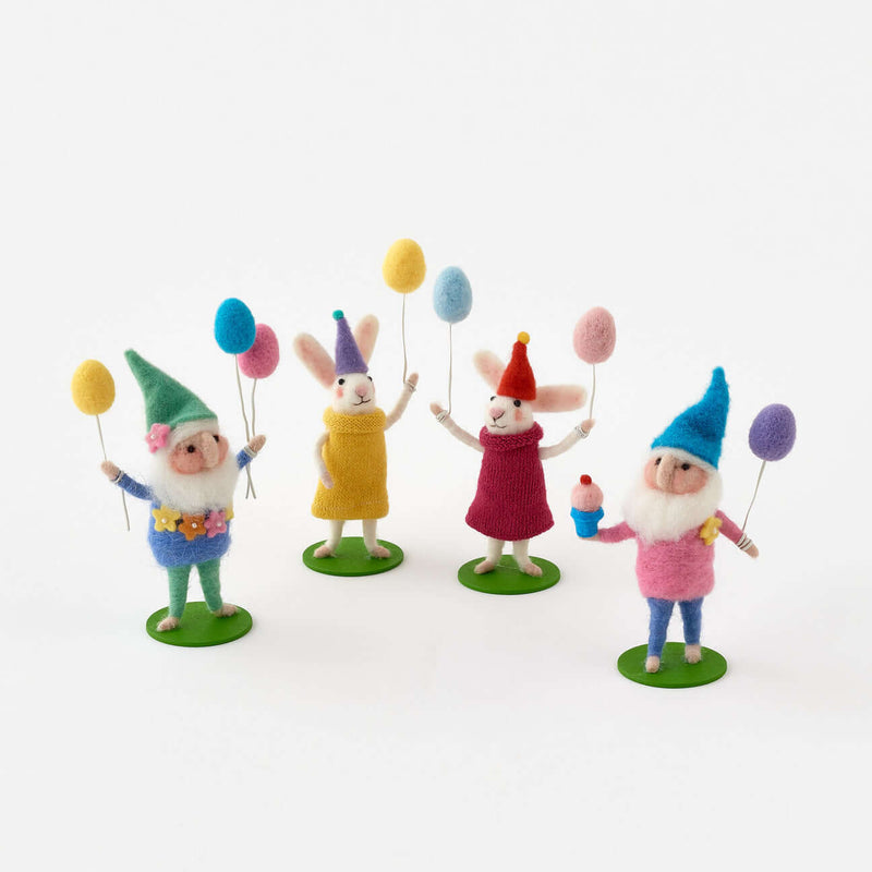 Set of four assorted birthday-themed festive characters.