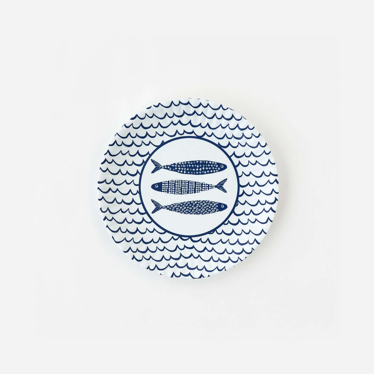 fish-inspired melamine dinner plate with a blue paper plate design.