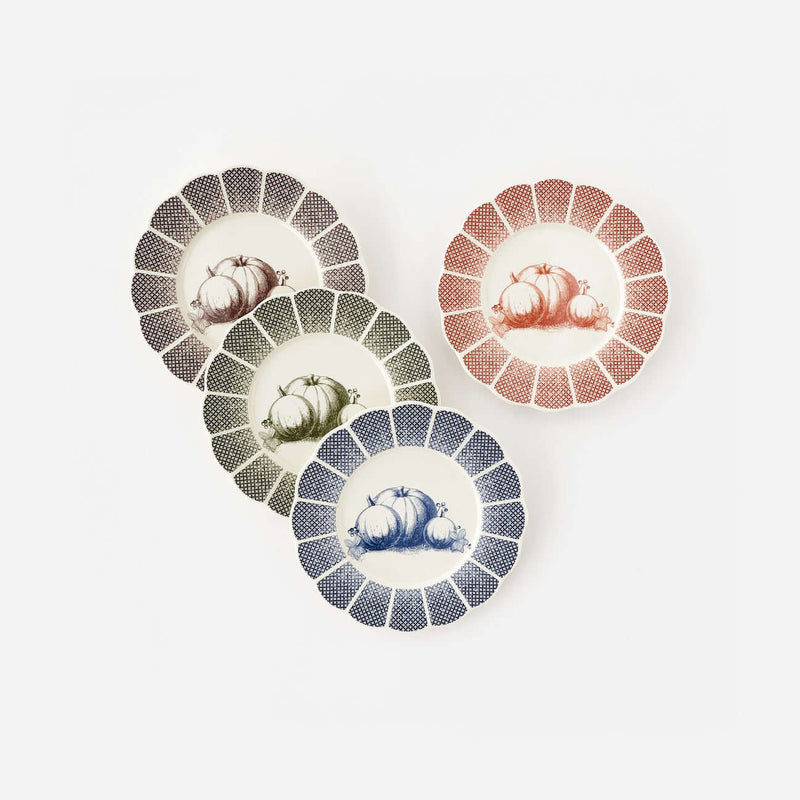 Pumpkin Scalloped Plates, Set of 4 featuring illustrated pumpkins and scalloped edges in four colors.