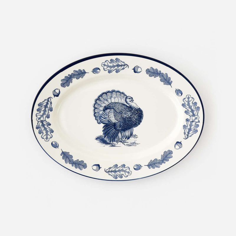 Turkey "Enamel" Oval Platter featuring a detailed turkey design with oak leaves on a classic blue-and-white background.