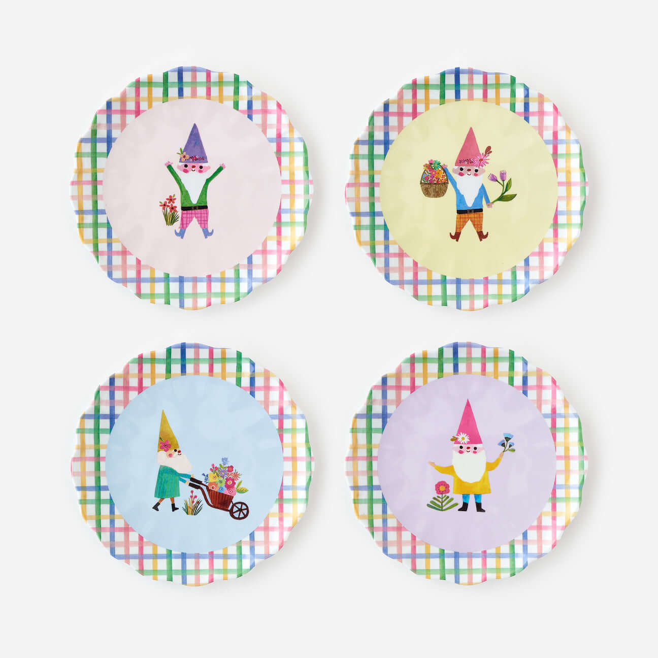 Set of four party plates featuring whimsical garden gnome illustrations.