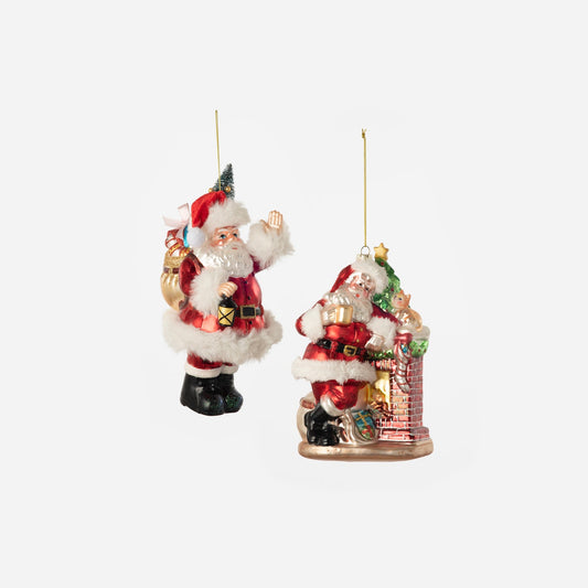 Two decorative Santa Claus ornaments on a white background
