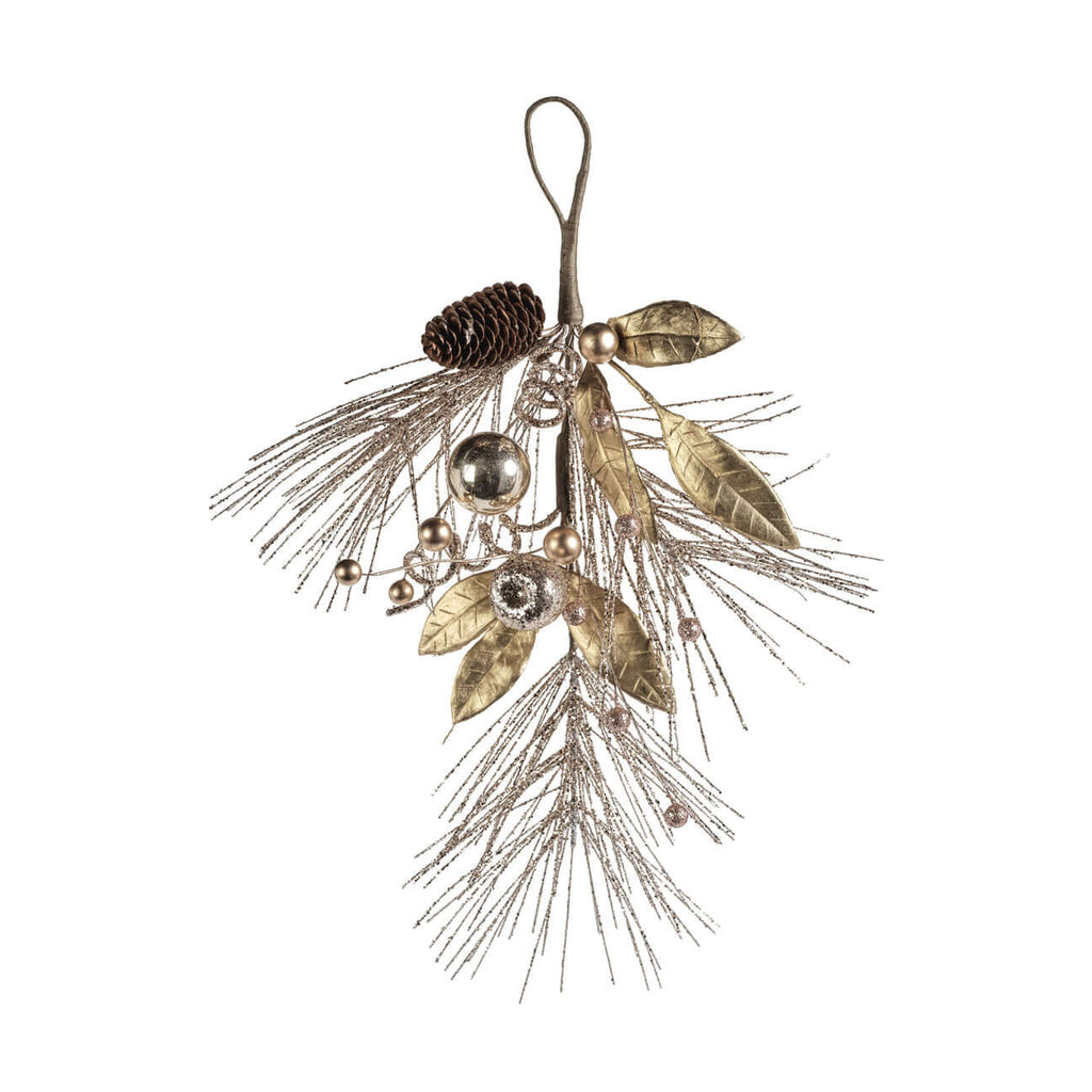 Decorative Christmas ornament with leaves, pine cones, and berries on a white background