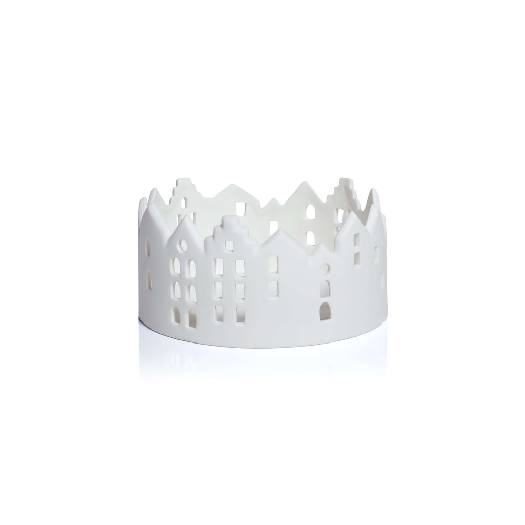 White decorative basket with cut-out patterns on a white background