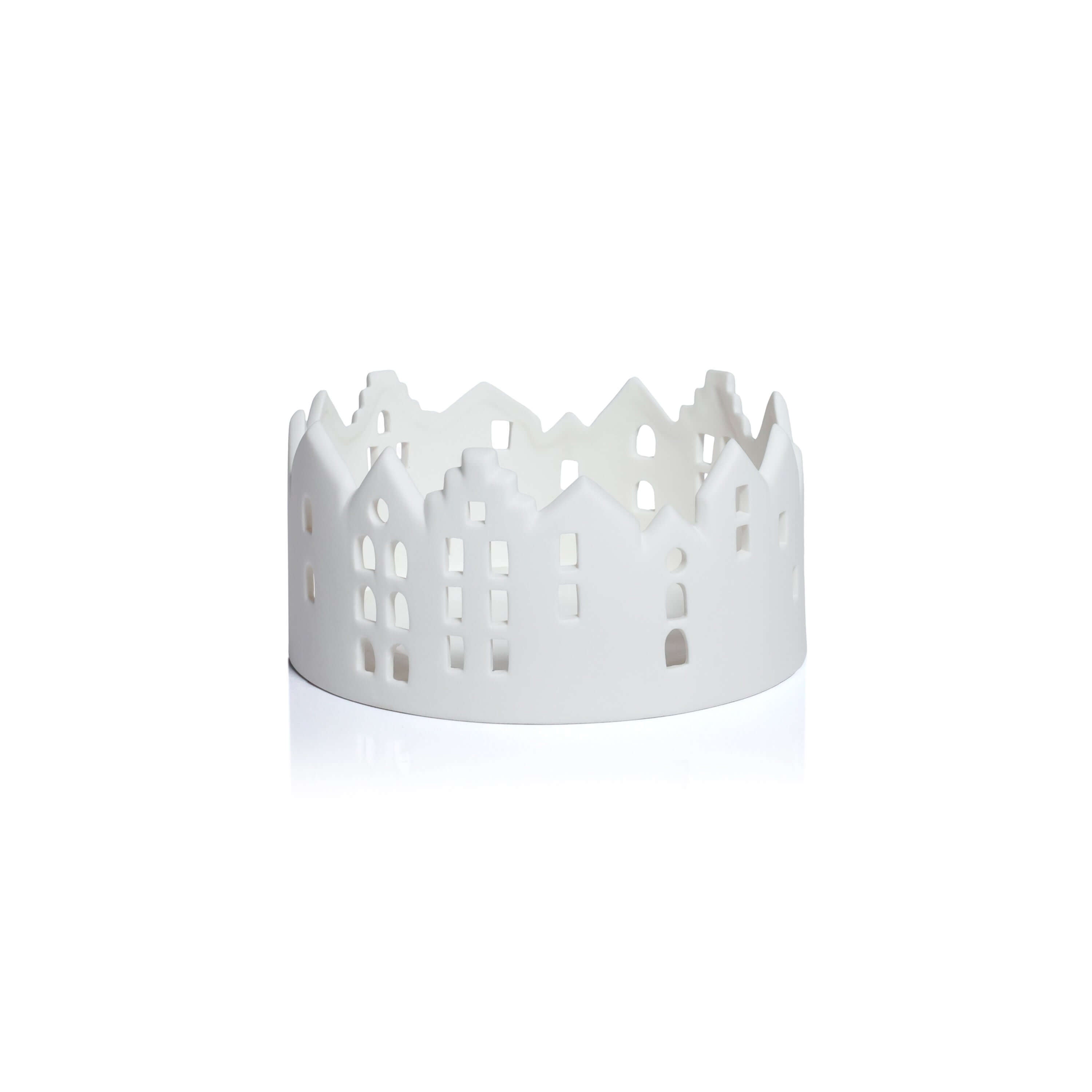White decorative basket with cut-out patterns on a white background