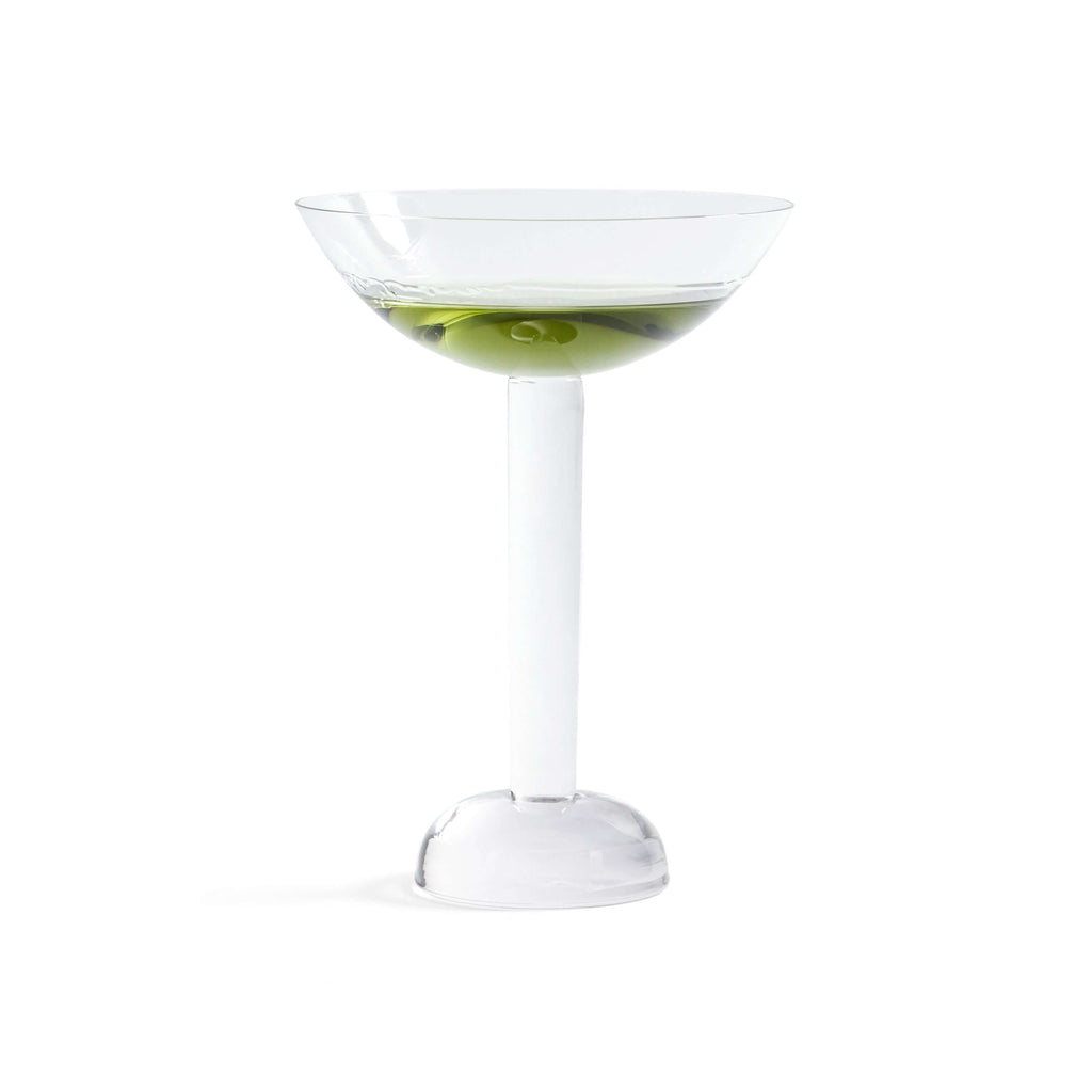 Elegant Madrid Glassware Collection glass featuring a green garnish, showcasing its unique solid sphere base design.