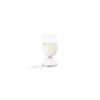 Madrid Glassware Collection featuring a sculptural glass with a solid sphere base and refined design.