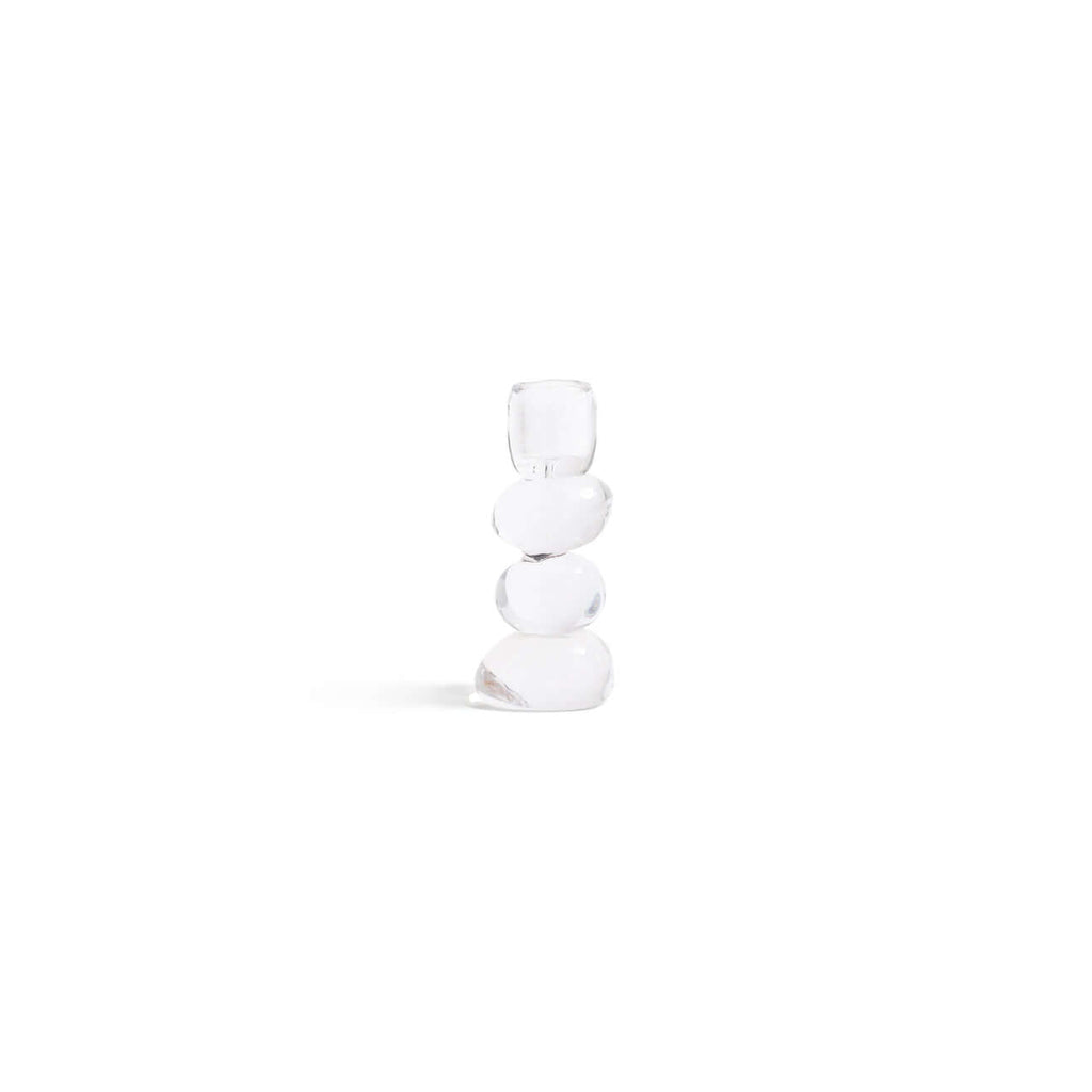Elegant Ice Stone Glass Taper Holder in small size, featuring stacked organic pebble forms for stunning candlelight display.