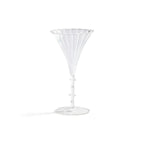 Clear martini glass on a white background