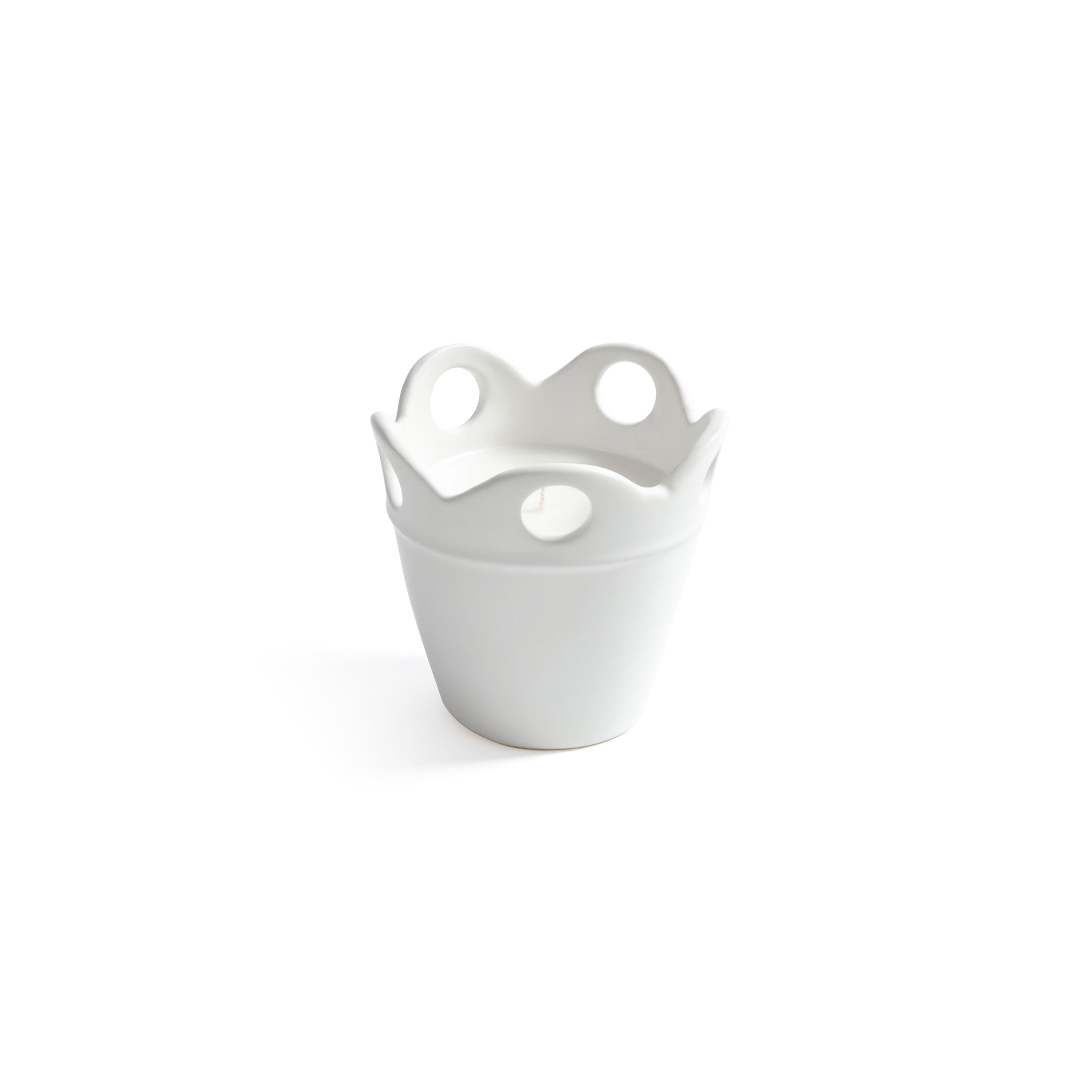 Citronella Pot Candle in matte white ceramic with scalloped rim and cut-out details.