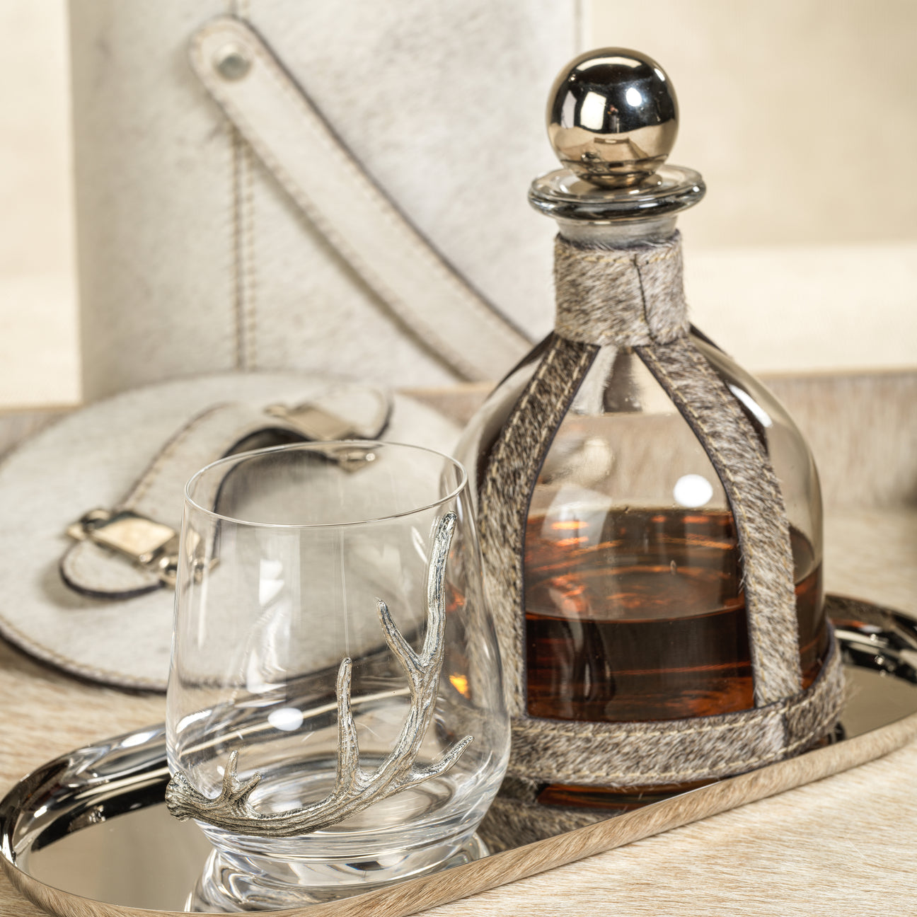 Decanter and glass with antler design on a tray