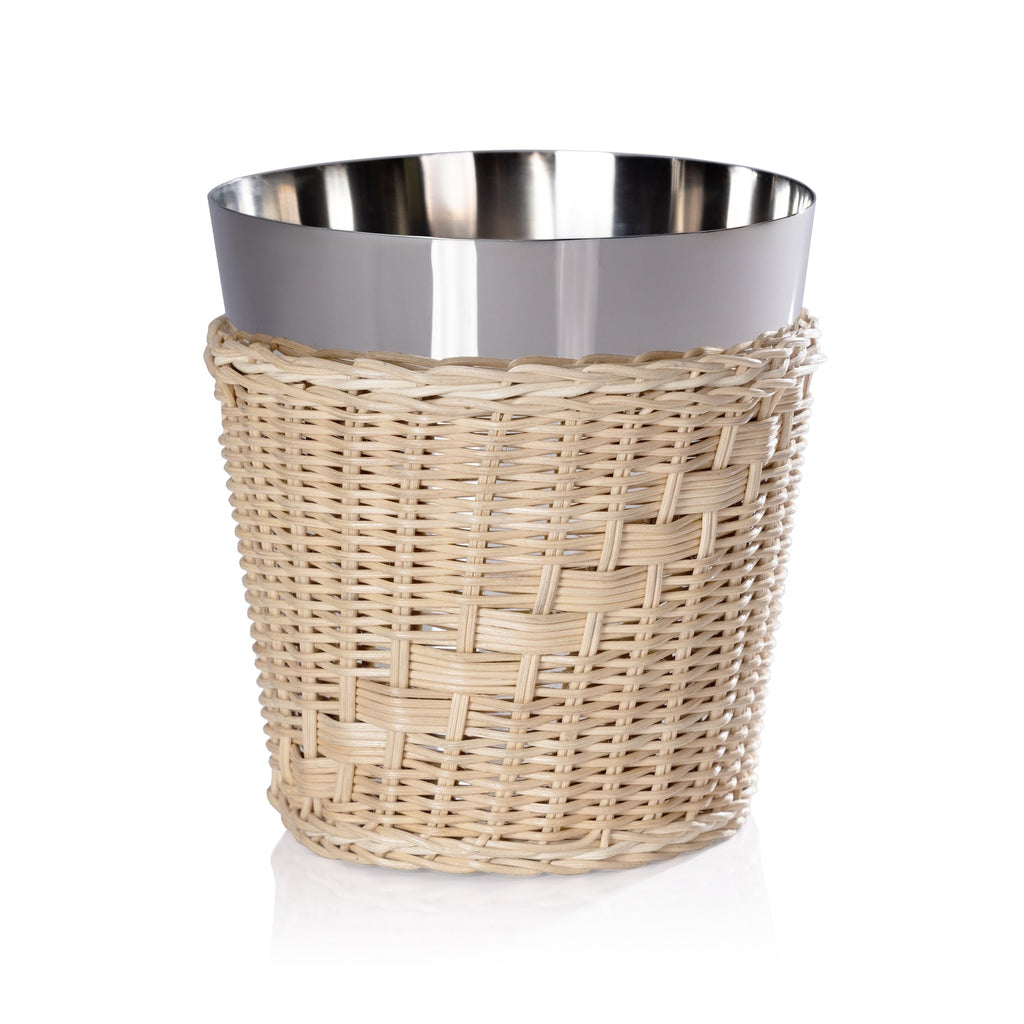The Palmier Wine and Champagne Bucket with handwoven rattan exterior and polished steel interior, displayed on a white surface.