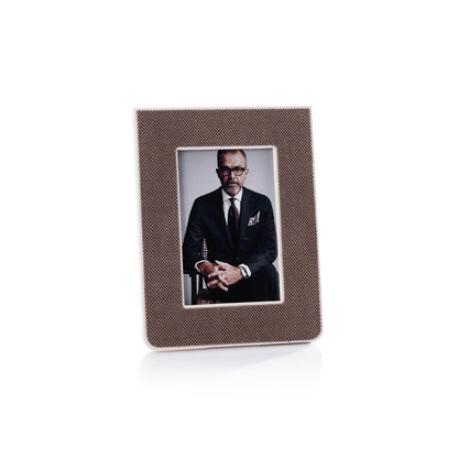 Brown textured picture frame with a portrait of a man on a white background