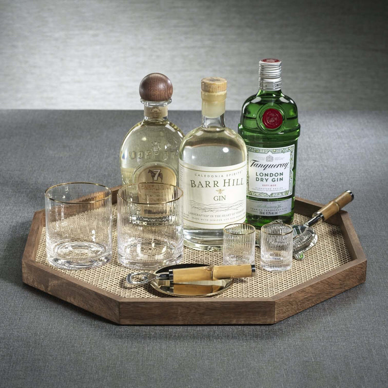 The Marais Tray showcasing premium gin bottles and glassware on a textured tabletop.