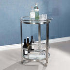 Élan Round Bar Cart / Trolley featuring polished chrome finish and clear glass shelves for stylish entertaining.