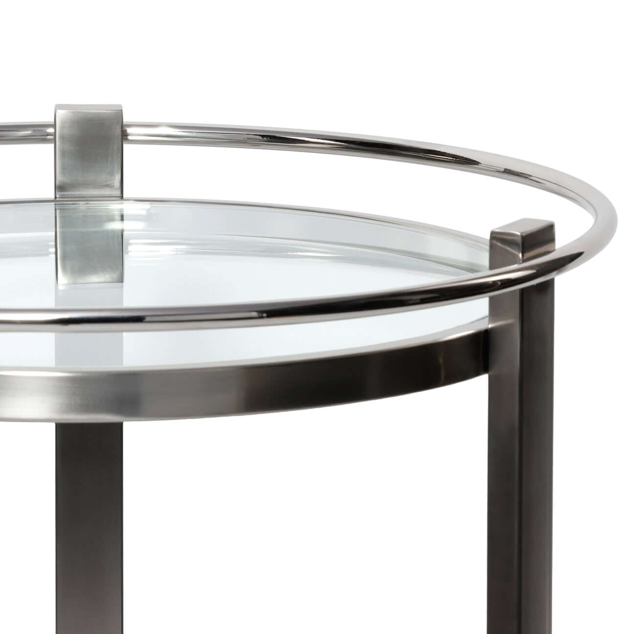 Élan Round Bar Cart / Trolley featuring a polished silver frame and clear glass top.